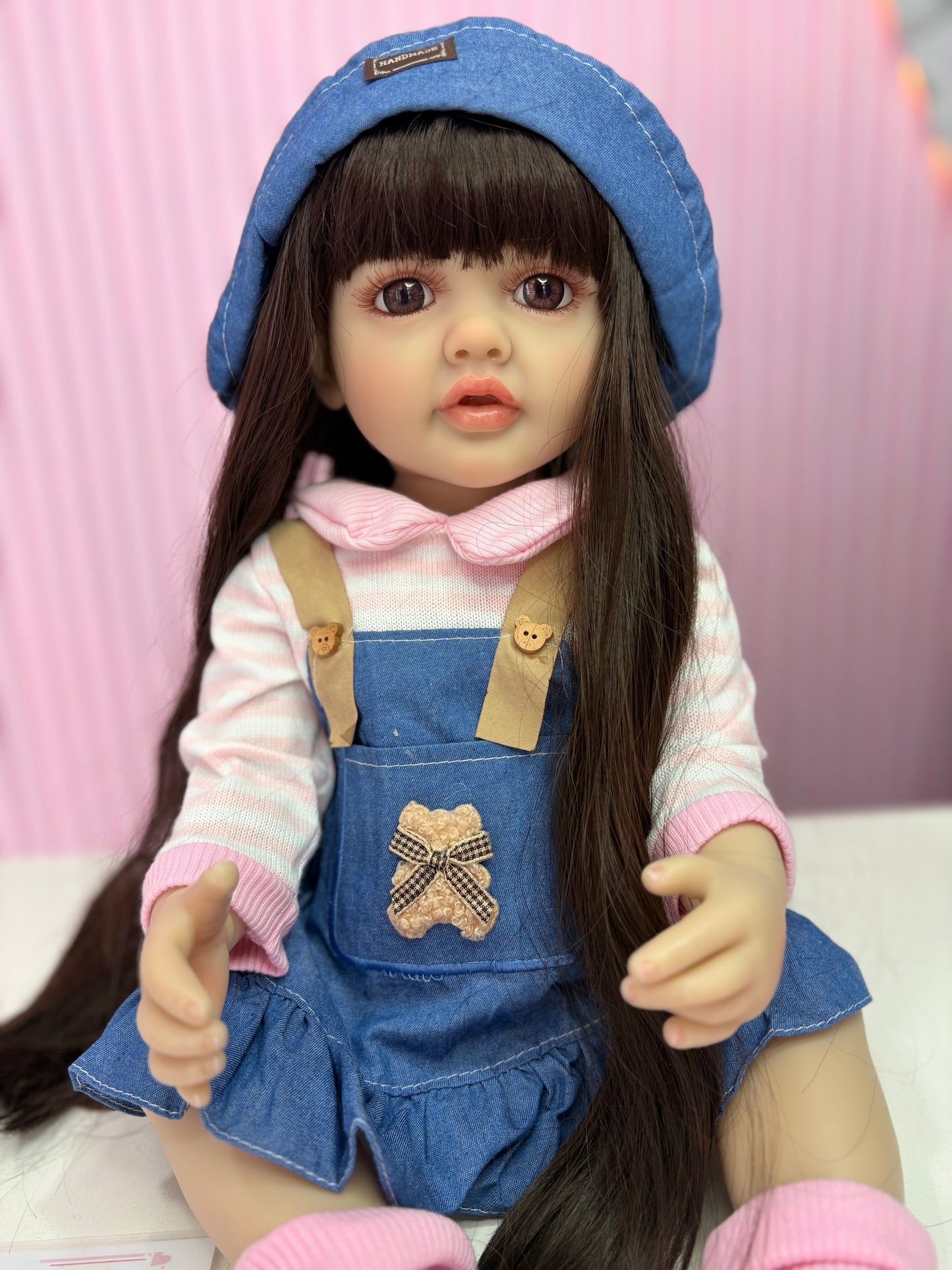 Niña Reborn mezclilla 55cm vinilo