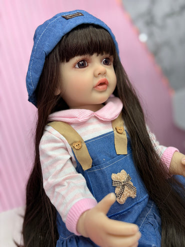 Niña Reborn mezclilla 55cm vinilo