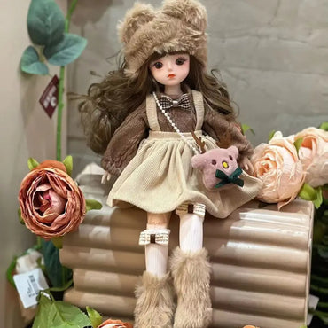Muñeca de colección 12”