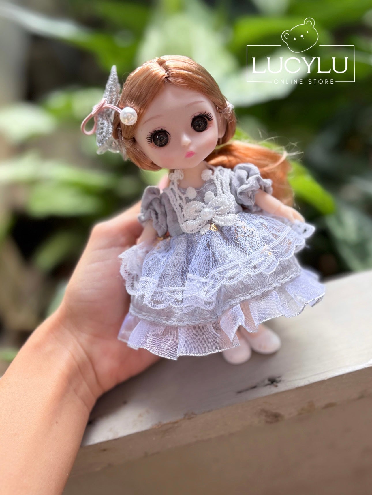 Muñeca pequeña coleccionable articulada