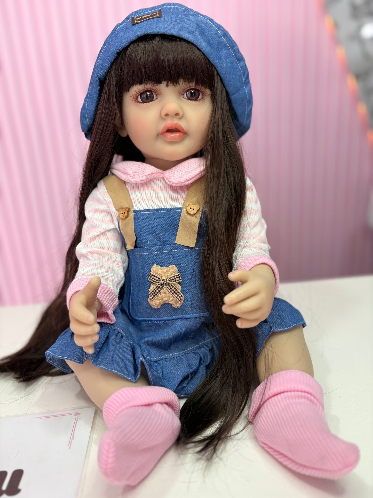 Niña Reborn mezclilla 55cm vinilo