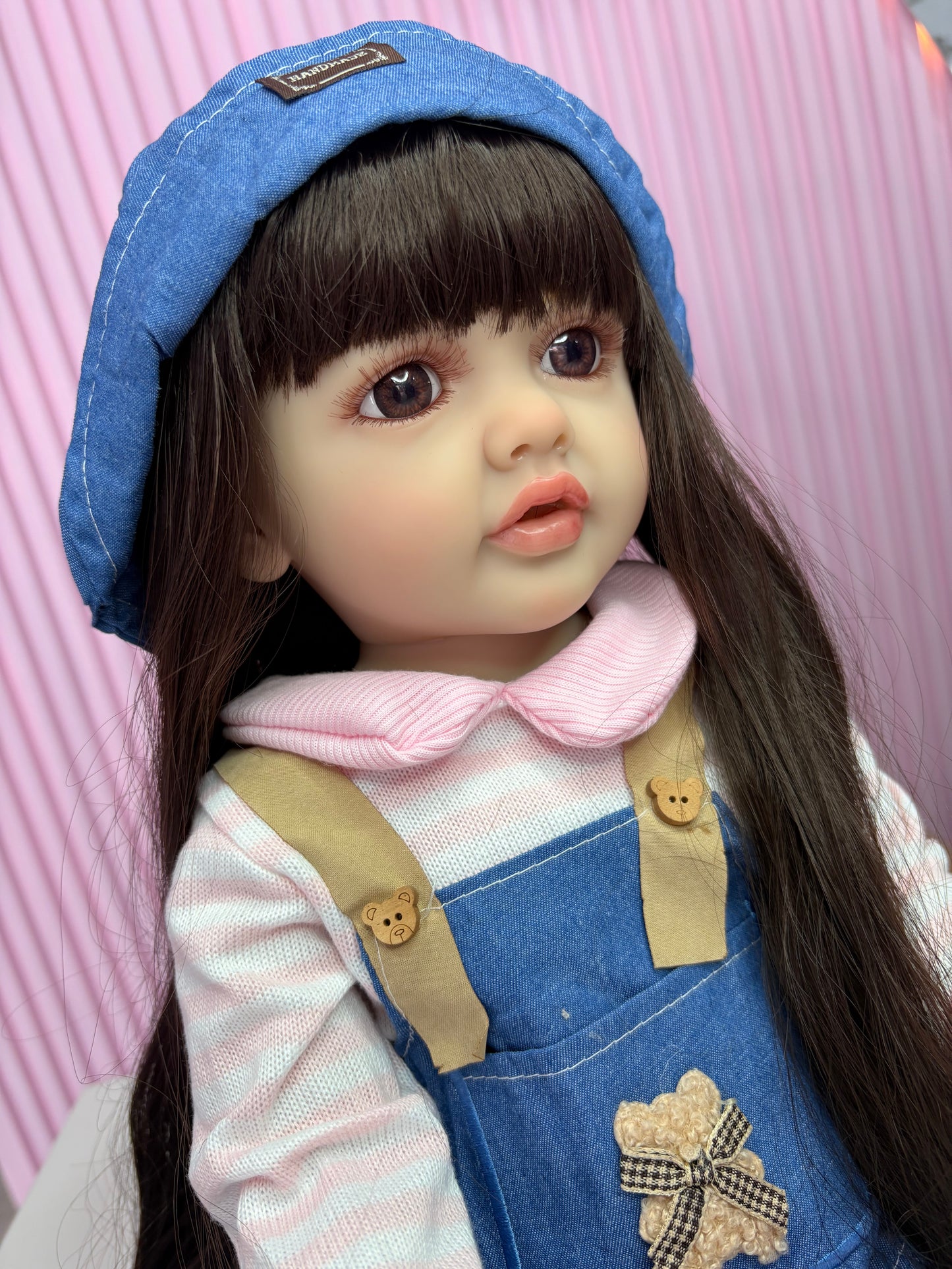 Niña Reborn mezclilla 55cm vinilo