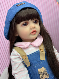 Niña Reborn mezclilla 55cm vinilo