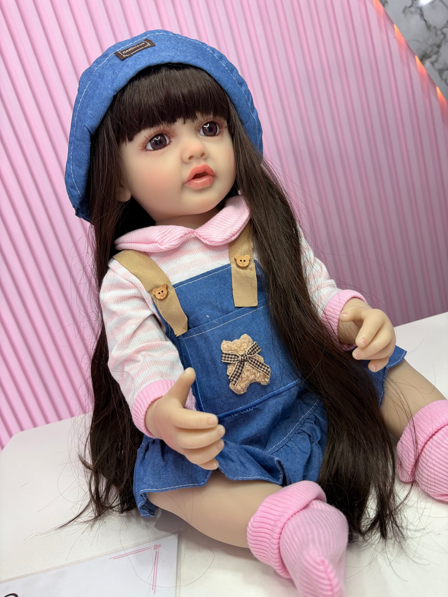 Niña Reborn mezclilla 55cm vinilo