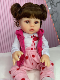 Niña Reborn cabello rizado 45cm