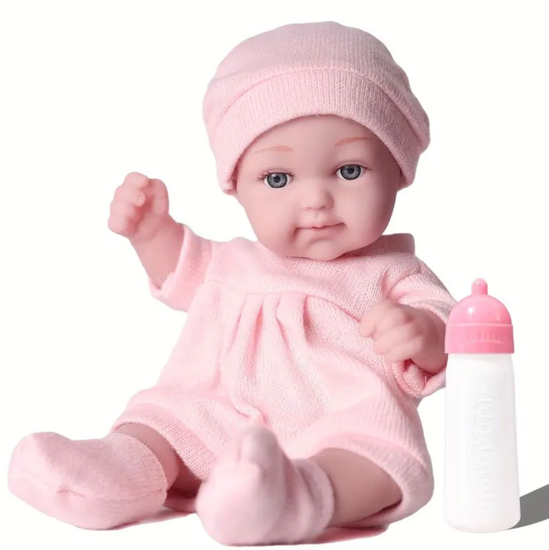 Muñeca con biberón 28cm