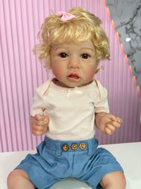 Niña rubia 55cm vinilo