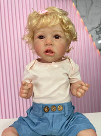 Niña rubia 55cm vinilo